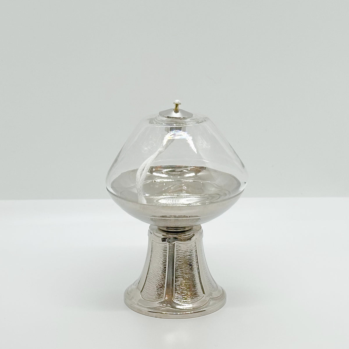 Lampada Trasparente Su Base Nichelata 10x14 cm